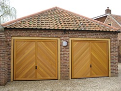 Pair of Hormann chevron cedar timber doors in Nottingham